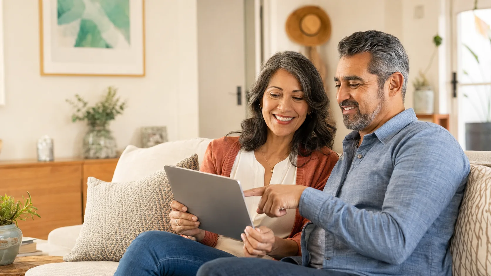 Couple reviewing information together at home